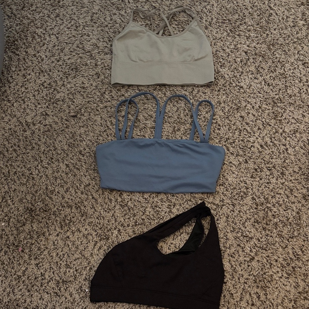 Set of Three Sports Bras in Black, Blue, and Cream